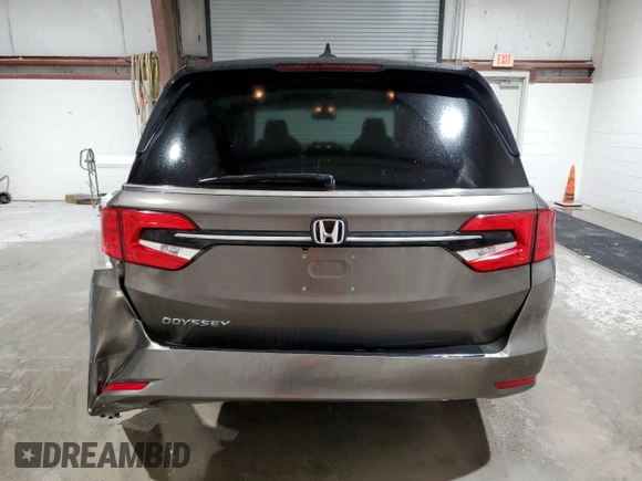 2022 Honda Odyssey EX-L z VIN 5FNRL6H71NB008541, wystawiony jako Copart lot #56850895 z przebiegiem 32 466 mil mil oraz Szkody całkowita. Historia ofert i sprzedaży dostępna na DreamBid. Obrazek 6.