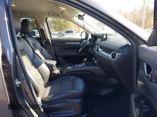 2017 Mazda CX-5 Touring with VIN JM3KFBCL3H0214881, listed as a IAAI auction lot 41694560 with 64,609 mi miles. Bid and sale history available at carsss.com. Image 5.
