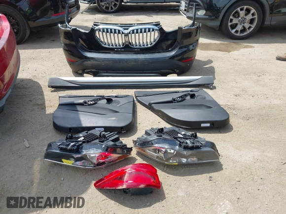 2021 BMW X1 sDrive28i with VIN WBXJG7C0XM5T45715, listed as a IAAI auction lot 42014499 with 23,793 mi miles and . Bid and sale history available at DreamBid. Image 12.
