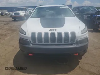 2015 Jeep Cherokee Trailhawk with VIN 1C4PJMBSXFW651000, listed as a Copart auction lot 64110515 with 135,571 mi miles and Clean title. Bid and sale history available at DreamBid. Image 5.