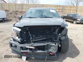2018 Ford F-150 XL z VIN 1FTEW1EG7JFD52734, wystawiony jako IAAI lot #42104352 z przebiegiem 68 614 mil mil oraz . Historia ofert i sprzedaży dostępna na DreamBid. Obrazek 12.