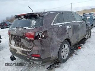 2019 Kia Sorento LX V6 with VIN 5XYPGDA5XKG569320, listed as a IAAI auction lot 41299982 with 115,407 mi miles. Bid and sale history available at carsss.com. Image 4.
