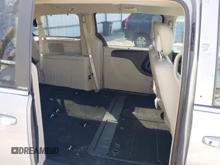 2013 Chrysler Town & Country Touring L with VIN 2C4RC1CG6DR660858, listed as a IAAI auction lot 41970976 with 140,299 mi miles and . Bid and sale history available at DreamBid. Image 8.