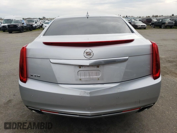 2014 Cadillac XTS Luxury with VIN 2G61M5S31E9217117, listed as a Copart auction lot 49659075 with 104,988 mi miles and Salvage Title. Bid and sale history available at DreamBid. Image 6.