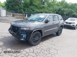 2021 Jeep Grand Cherokee Laredo X with VIN 1C4RJFAG6MC774728, listed as a IAAI auction lot 42270184 with 27,021 mi miles and . Bid and sale history available at DreamBid. Image 2.