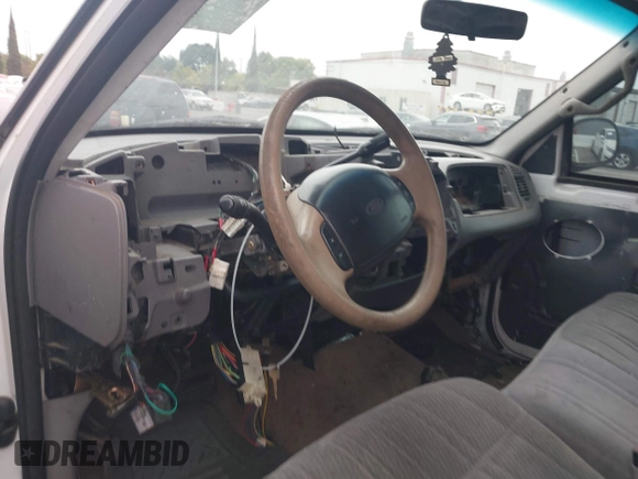 1997 Ford F-150 z VIN 1FTDX17W2VKB82664, wystawiony jako IAAI lot #42554831 z przebiegiem Nie podano mil oraz . Historia ofert i sprzedaży dostępna na DreamBid. Obrazek 6.