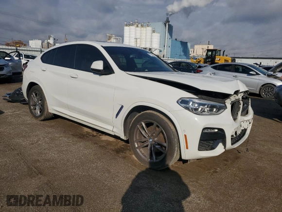 2019 BMW X4 xDrive30i with VIN 5UXUJ3C5XKLG54286, listed as a Copart auction lot 77333284 with 99,771 mi miles and Salvage Title. Bid and sale history available at carsss.com. Image 4.