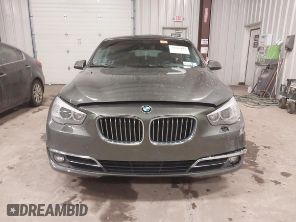 2014 BMW 5 Series 535i Gran Turismo xDrive z VIN WBA5M4C59ED183503, wystawiony jako IAAI lot #41983117 z przebiegiem 136 186 mil mil oraz . Historia ofert i sprzedaży dostępna na DreamBid. Obrazek 12.