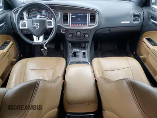 2012 Dodge Charger SXT with VIN 2C3CDXHG2CH244247, listed as a Copart auction lot 48321705 with 144,488 mi miles and Salvage Title. Bid and sale history available at DreamBid. Image 8.