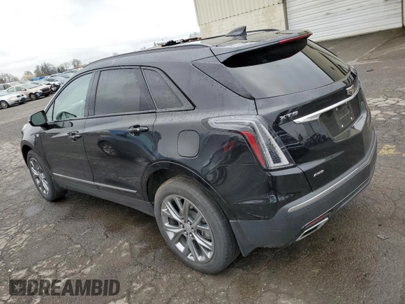 2021 Cadillac XT5 AWD Sport z VIN 1GYKNGRS3MZ158562, wystawiony jako Copart lot #43593295 z przebiegiem 32 293 mil mil oraz Szkoda całkowita • Salvage title. Historia ofert i sprzedaży dostępna na DreamBid. Obrazek 2.