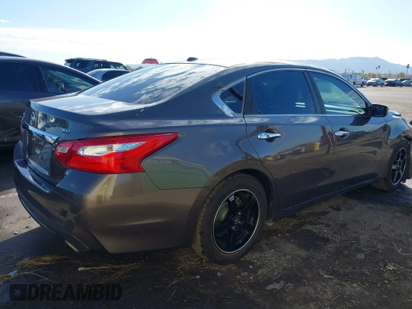 2017 Nissan Altima S with VIN 1N4AL3AP6HC158853, listed as a IAAI auction lot 41442647 with 132,684 mi miles and . Bid and sale history available at DreamBid. Image 4.