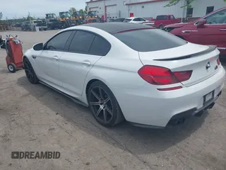 2015 BMW M6 z VIN WBS6C9C50FD467538, wystawiony jako IAAI lot #42366043 z przebiegiem 66 379 mil mil oraz . Historia ofert i sprzedaży dostępna na DreamBid. Obrazek 3.