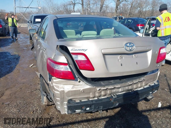 2009 Toyota Camry with VIN 4T4BE46K79R100114, listed as a IAAI auction lot 41656476 with 127,404 mi miles. Bid and sale history available at carsss.com. Image 3.