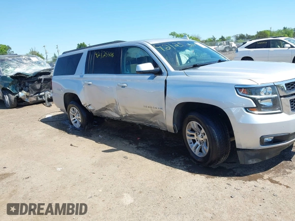 2017 Chevrolet Suburban LT z VIN 1GNSKHKC9HR268651, wystawiony jako IAAI lot #42125406 z przebiegiem 174 451 mil mil oraz . Historia ofert i sprzedaży dostępna na DreamBid. Obrazek 13.