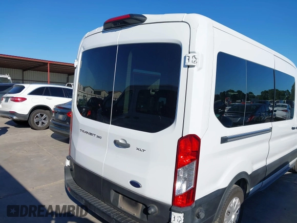 2024 Ford Transit Passenger XL with VIN 1FBAX2C82RKA51776, listed as a IAAI auction lot 42218695 with 23,221 mi miles and . Bid and sale history available at DreamBid. Image 4.