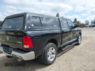 2014 Ram 1500 Big Horn with VIN 1C6RR7LM6ES286105, listed as a IAAI auction lot 42338726 with 123,018 mi miles and . Bid and sale history available at DreamBid. Image 4.