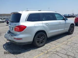 2014 Mercedes-Benz GL 450 z VIN 4JGDF7CE9EA411572, wystawiony jako IAAI lot #42461631 z przebiegiem 121 885 mil mil oraz . Historia ofert i sprzedaży dostępna na DreamBid. Obrazek 4.