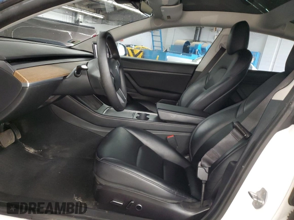 2021 Tesla Model 3 Standard Range Plus z VIN 5YJ3E1EA4MF943036, wystawiony jako Copart lot #54008355 z przebiegiem 62 981 mil mil oraz Szkoda całkowita • Salvage title. Historia ofert i sprzedaży dostępna na DreamBid. Obrazek 7.