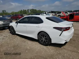 2023 Toyota Camry SE with VIN 4T1G11AKXPU767953, listed as a Copart auction lot 50728415 with 63,249 mi miles and Salvage Title. Bid and sale history available at DreamBid. Image 2.