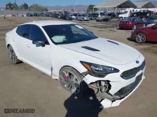 2020 Kia Stinger GT with VIN KNAE35LC7L6085529, listed as a IAAI auction lot 40671705 with 62,970 mi miles. Bid and sale history available at carsss.com. Image 1.