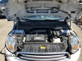 2015 MINI Countryman with VIN WMWZB3C55FWR44759, listed as a Copart auction lot 55836815 with 102,472 mi miles and Salvage title. Bid and sale history available at DreamBid. Image 11.