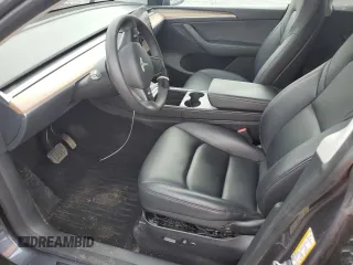 2023 Tesla Model Y Long Range z VIN 7SAYGDEE1PF937867, wystawiony jako Copart lot #51615195 z przebiegiem 88 912 mil mil oraz Szkoda całkowita • Salvage title. Historia ofert i sprzedaży dostępna na DreamBid. Obrazek 7.