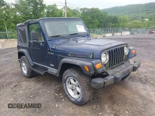 2000 Jeep Wrangler SE with VIN 1J4FA29P6YP777153, listed as a IAAI auction lot 42313752 with Not provided miles and . Bid and sale history available at DreamBid. Image 1.
