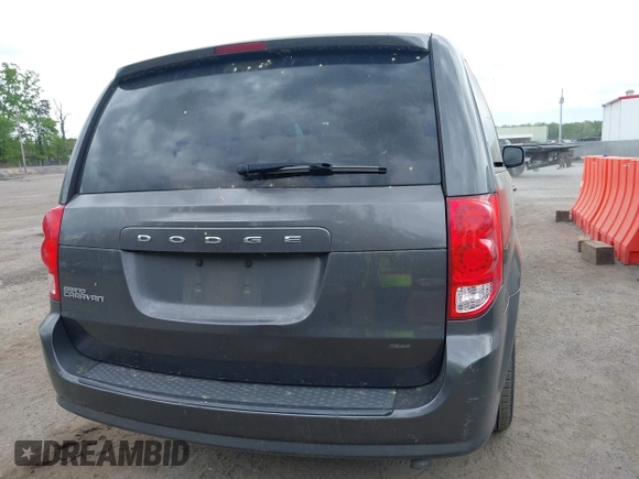 2015 Dodge Grand Caravan American Value with VIN 2C4RDGBG2FR542844, listed as a IAAI auction lot 42109983 with 129,718 mi miles and . Bid and sale history available at DreamBid. Image 16.