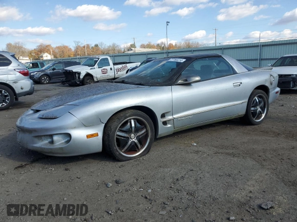 1999 Pontiac Firebird Firebird z VIN 2G2FS22K7X2214737, wystawiony jako Copart lot #77784414 z przebiegiem 93 670 mil mil oraz Czysty tytuł • Clean title. Historia ofert i sprzedaży dostępna na DreamBid. Obrazek 1.