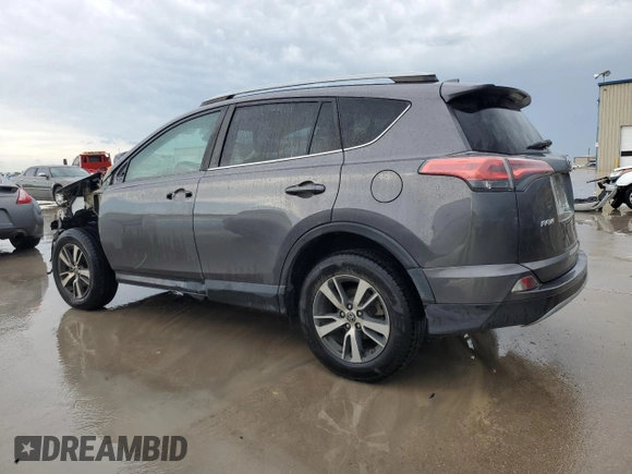 2018 Toyota RAV4 XLE with VIN 2T3WFREV6JW411935, listed as a Copart auction lot 54218405 with 123,831 mi miles and Salvage title. Bid and sale history available at DreamBid. Image 2.