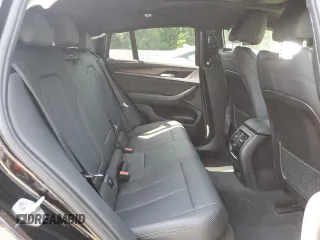 2021 BMW X4 xDrive30i with VIN 5UX2V1C09M9E03411, listed as a Copart auction lot 62078545 with 49,101 mi miles and Salvage title. Bid and sale history available at DreamBid. Image 11.
