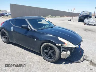 2013 Nissan 370Z z VIN JN1AZ4EH8DM880849, wystawiony jako IAAI lot #42131189 z przebiegiem Nie podano mil oraz . Historia ofert i sprzedaży dostępna na DreamBid. Obrazek 1.