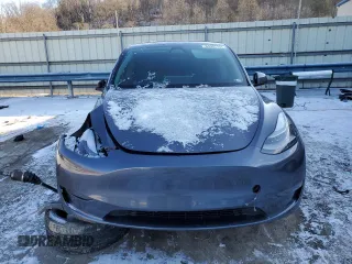 2023 Tesla Model Y Long Range with VIN 7SAYGDEE6PF752570, listed as a Copart auction lot 84927794 with 52,297 mi miles and Salvage Title. Bid and sale history available at DreamBid. Image 5.
