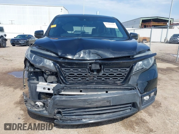 2019 Honda Passport EX-L with VIN 5FNYF7H59KB003011, listed as a IAAI auction lot 41563219 with 78,239 mi miles and . Bid and sale history available at carsss.com. Image 6.