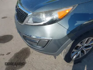 2015 Kia Sportage LX with VIN KNDPBCAC2F7764189, listed as a IAAI auction lot 42144059 with 181,247 mi miles and . Bid and sale history available at carsss.com. Image 6.