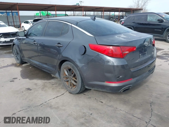 2011 Kia Optima LX with VIN KNAGM4A72B5057583, listed as a IAAI auction lot 41649320 with 207,898 mi miles and . Bid and sale history available at DreamBid. Image 3.
