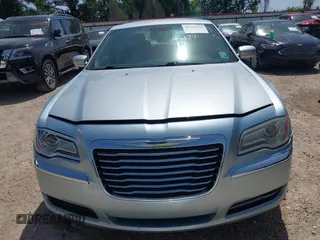 2013 Chrysler 300 z VIN 2C3CCAAG4DH728383, wystawiony jako IAAI lot #42243346 z przebiegiem 208 955 mil mil oraz . Historia ofert i sprzedaży dostępna na DreamBid. Obrazek 13.