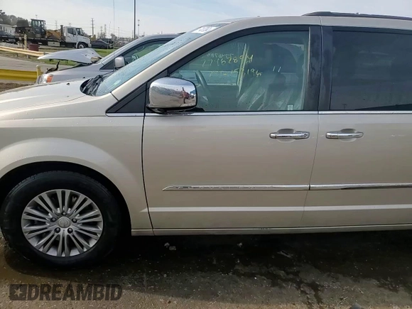 2015 Chrysler Town & Country Touring L with VIN 2C4RC1CG0FR513812, listed as a Copart auction lot 77467854 with 157,196 mi miles and Clean Title. Bid and sale history available at DreamBid. Image 14.
