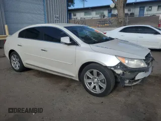 2012 Buick LaCrosse Leather with VIN 1G4GC5E31CF101728, listed as a Copart auction lot 54929695 with 197,313 mi miles and Salvage title. Bid and sale history available at DreamBid. Image 4.