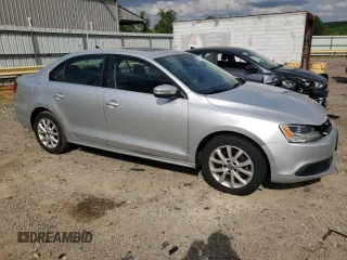 2013 Volkswagen Jetta SE with VIN 3VWDX7AJ6DM359415, listed as a Copart auction lot 54653435 with 189,463 mi miles and Clean title. Bid and sale history available at DreamBid. Image 4.
