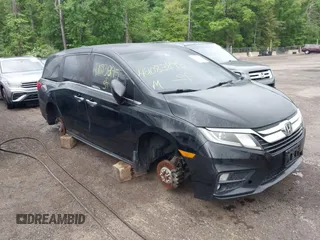 2018 Honda Odyssey EX-L z VIN 5FNRL6H71JB093357, wystawiony jako IAAI lot #42083895 z przebiegiem 194 211 mil mil oraz . Historia ofert i sprzedaży dostępna na DreamBid. Obrazek 1.