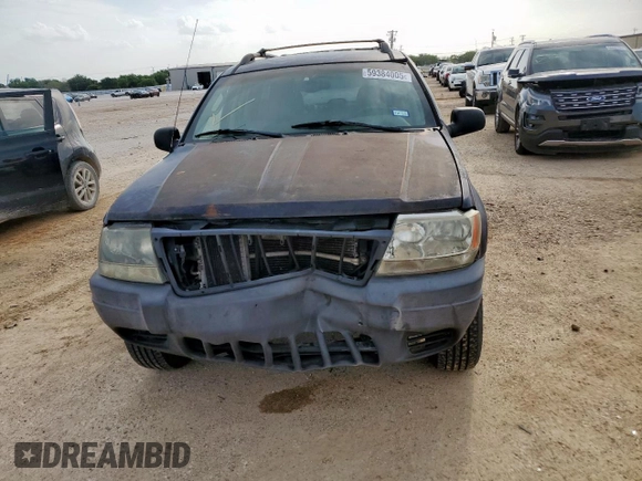 2004 Jeep Grand Cherokee with VIN 1J8GX58J54C121513, listed as a Copart auction lot 59384005 with 221,397 mi miles and Salvage title. Bid and sale history available at DreamBid. Image 5.
