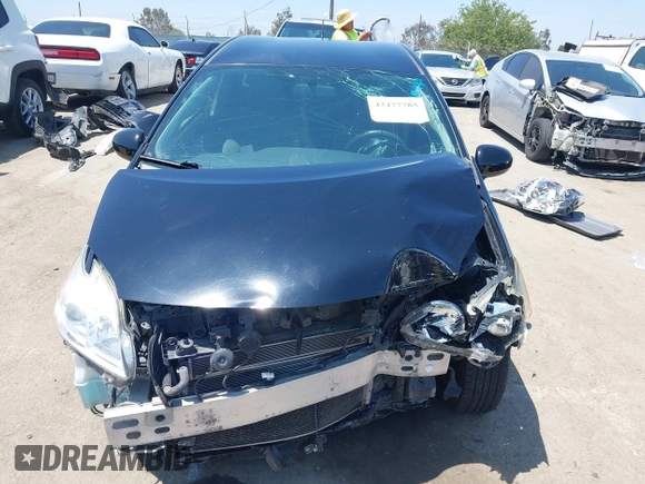 2015 Toyota Prius Four z VIN JTDKN3DU3F1914593, wystawiony jako IAAI lot #42477785 z przebiegiem 127 244 mil mil oraz . Historia ofert i sprzedaży dostępna na DreamBid. Obrazek 13.