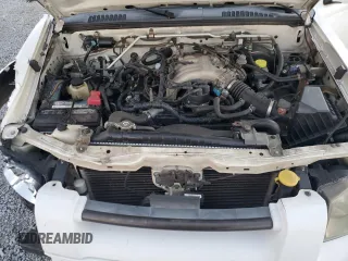2004 Nissan Frontier LE with VIN 1N6ED27T14C451784, listed as a Copart auction lot 83341854 with 137,982 mi miles and Salvage title. Bid and sale history available at DreamBid. Image 12.