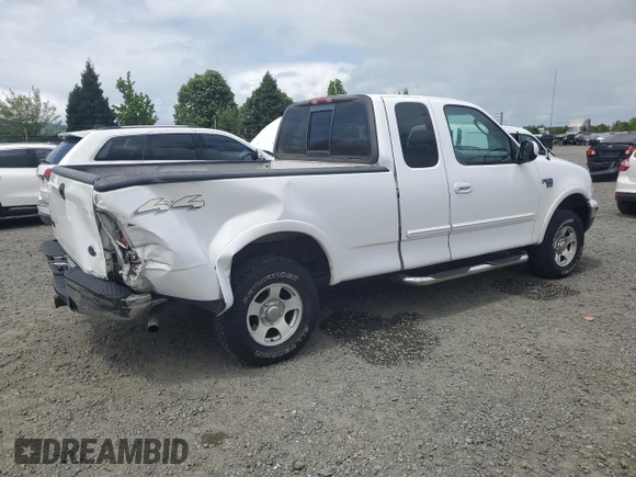 2002 Ford F-150 XL with VIN 1FTRX18L62KC53807, listed as a Copart auction lot 57463075 with 173,301 mi miles and Salvage title. Bid and sale history available at DreamBid. Image 3.