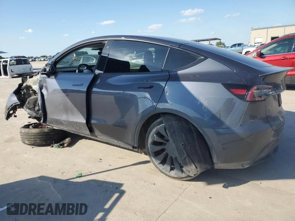 2022 Tesla Model Y Performance with VIN 7SAYGDEF8NF384270, listed as a Copart auction lot 56718215 with Not provided miles and Salvage title. Bid and sale history available at DreamBid. Image 2.