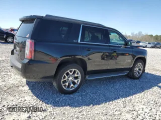 2015 GMC Yukon SLT z VIN 1GKS1BKC2FR244797, wystawiony jako Copart lot #49465995 z przebiegiem 242 448 mil mil oraz Szkoda całkowita • Salvage title. Historia ofert i sprzedaży dostępna na DreamBid. Obrazek 3.