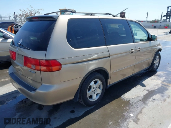 2001 Honda Odyssey EX z VIN 2HKRL18611H553161, wystawiony jako IAAI lot #42339181 z przebiegiem 89 235 mil mil oraz . Historia ofert i sprzedaży dostępna na DreamBid. Obrazek 4.