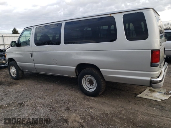 2002 Ford Econoline Passenger XL with VIN 1FBSS31L12HA34583, listed as a Copart auction lot 86967804 with 205,413 mi miles and Salvage title. Bid and sale history available at DreamBid. Image 2.