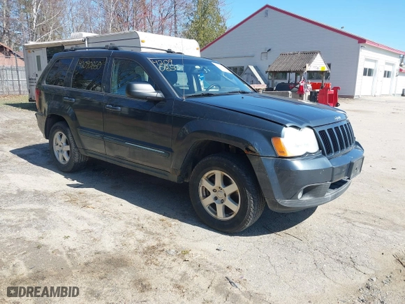 2008 Jeep Grand Cherokee Laredo with VIN 1J8GR48K98C161239, listed as a IAAI auction lot 42090850 with 218,063 mi miles. Bid and sale history available at carsss.com. Image 1.